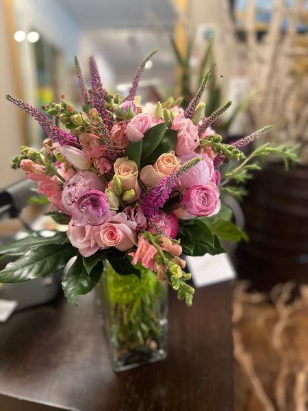 Classic Collection: hand-tied bouquet wrapped in leaves — Stems